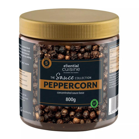Jar of Essential Cuisine peppercorns with a gold lid on a white background