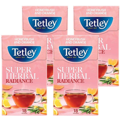 Four boxes of Tetley Honeybush and Orange tea on a white background