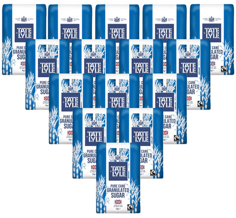 Multiple packages of Tate & Lyle sugar on a white background